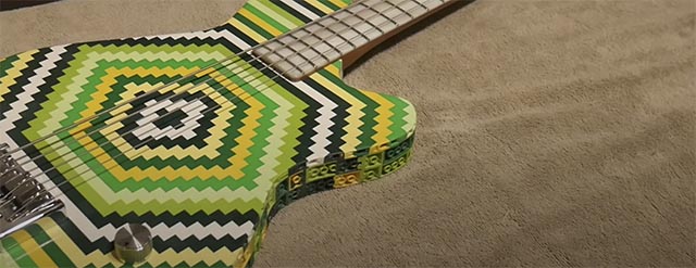 Bass guitar made mostly lego bricks, guess what it sounds like